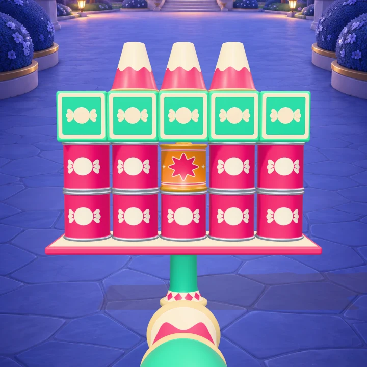 Sugar Smash gameplay: a tower of candy boxes, pink cans, truffles and an orange fizzy popper in a blue candy courtyard